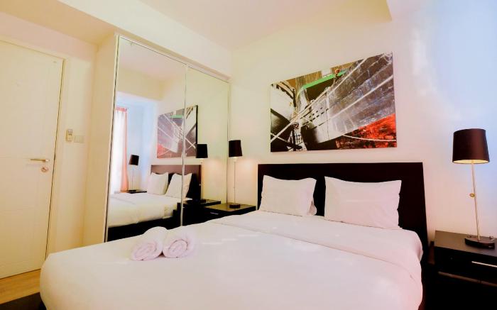 Homey 2BR Apt @ Casa Grande Residence By Travelio