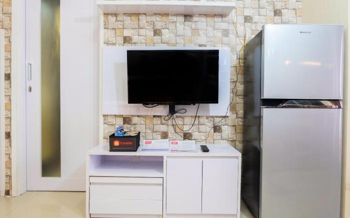 Modern 2BR with City View at Bassura Apartment By Travelio