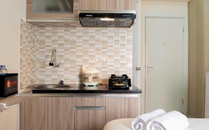 Comfortable Studio Green Pramuka City By Travelio