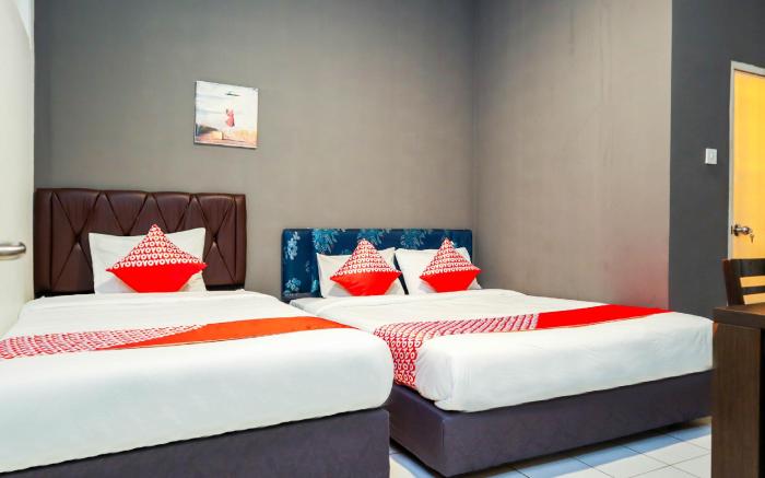 OYO 1111 Pasar Baru Inn