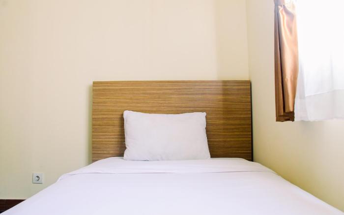Modern 2BR at The Wave Epicentrum Apt By Travelio