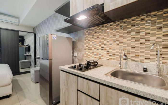 Homey Studio @ Grand Kamala Lagoon Apt By Travelio
