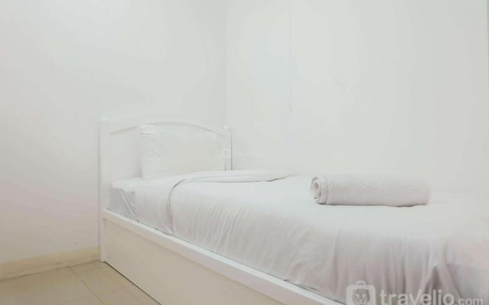 Pleasant 2BR Apartment at Bassura City By Travelio