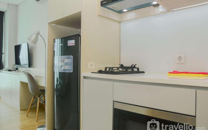 Studio Room @ Capitol Suites Apartment By Travelio