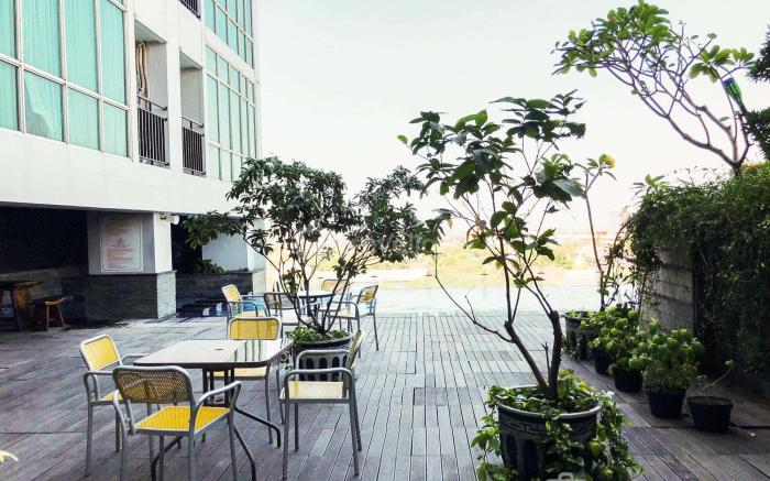 Cozy Studio at Tamansari Papilio Apt By Travelio
