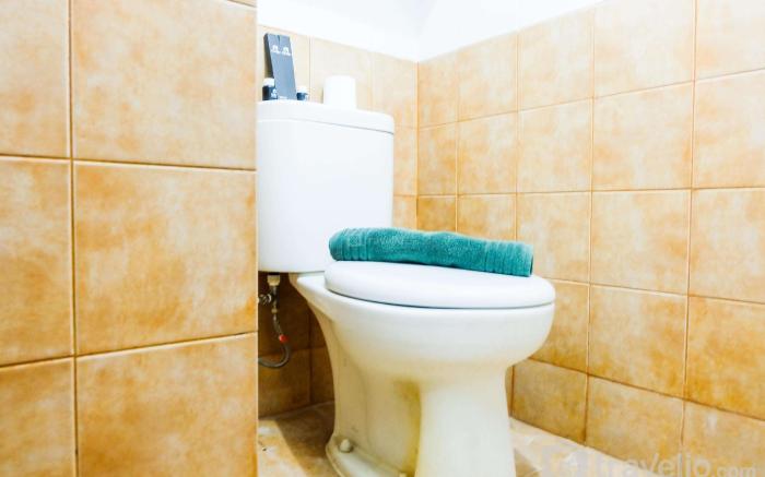 Pleasant 2BR Apartment @ Green Pramuka By Travelio