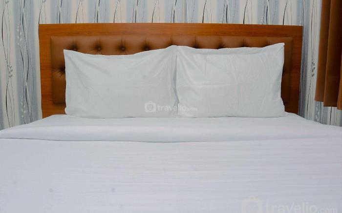 Nice Design 2BR Bassura City Apt By Travelio