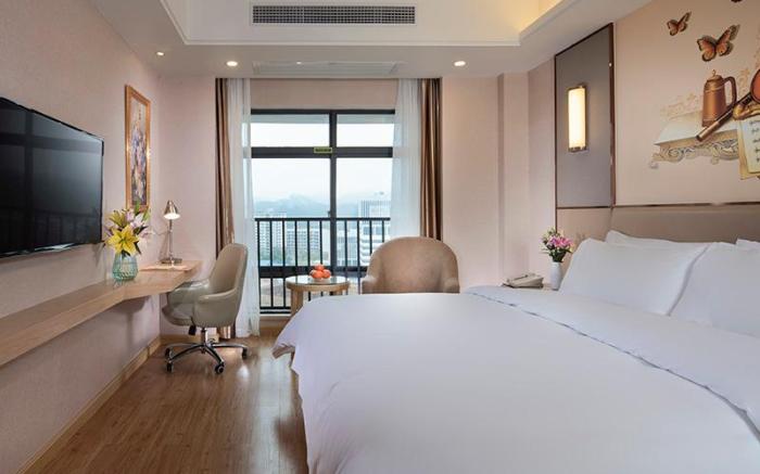 Vienna Hotel Nanning Xiangsi Lake University Town