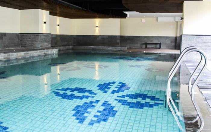 Exquisite 2BR Apt @Tamansari La Grande By Travelio