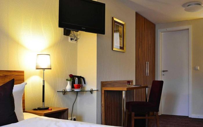 Comfort Hotel tom Kyle