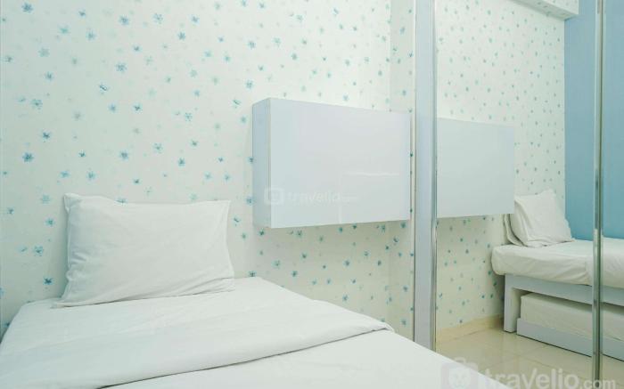 Best Comfy 2BR Green Pramuka Apartment By Travelio