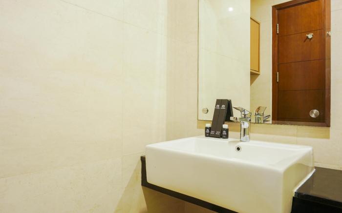 Relax Studio at Capitol Park Residence By Travelio