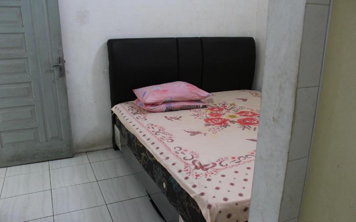 Penginapan Transit Tomato
