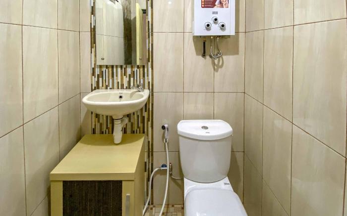 Tini's Guest House Malang Mitra RedDoorz