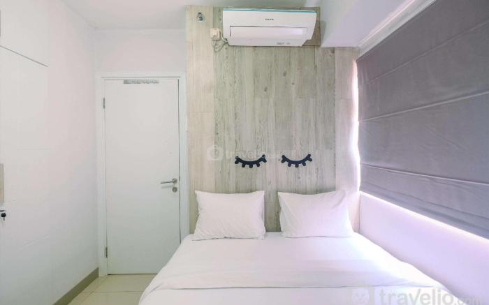 Furnished Green Pramuka 1BR Apartment By Travelio