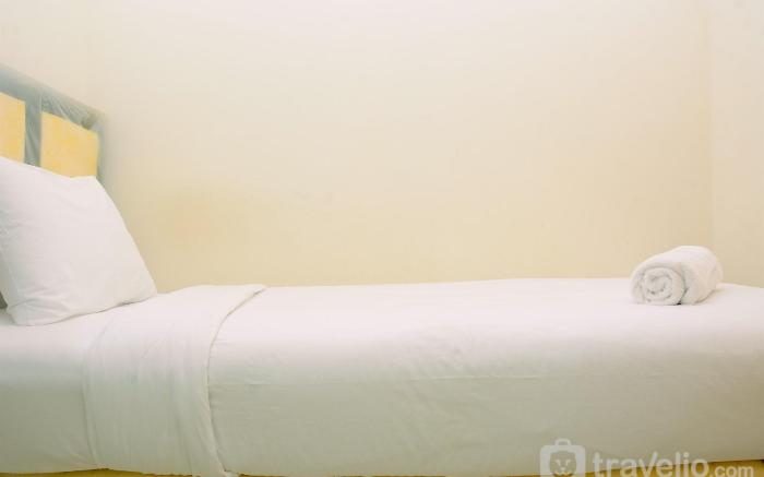 Relax 2BR Green Pramuka City Apartment By Travelio