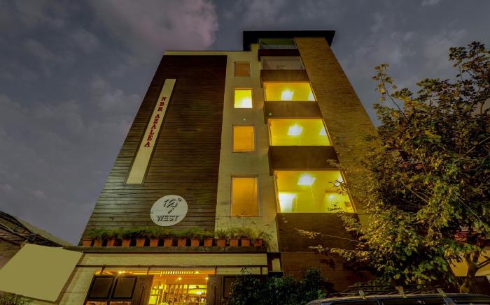 Treebo 12 Degrees West, 750 M From Embassy Golf Links Business Park