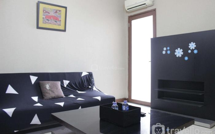 Strategic and Cozy 2BR at Majesty Apt By Travelio