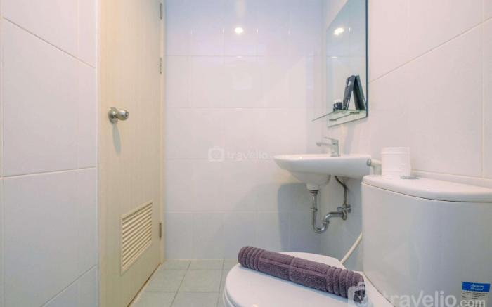 Modern and Compact Studio at Patraland Urbano Apartment By Travelio