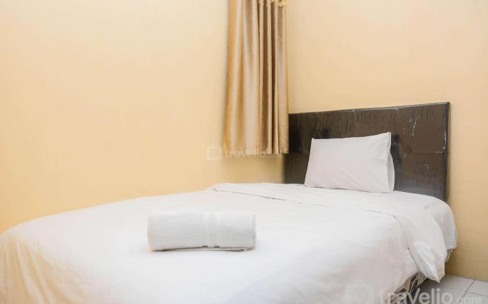 Comfy 2BR Mutiara Bekasi Apartement By Travelio