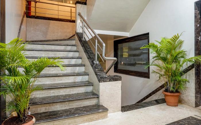Super Townhouse OAK Regal Inn Near Sant Tukaram Nagar Metro Station