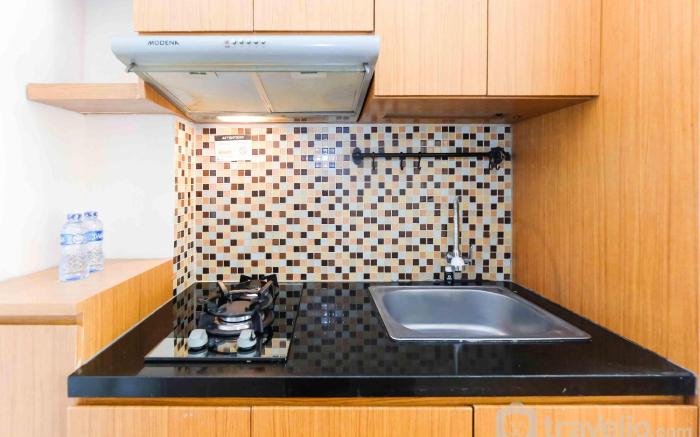 Homey and Cozy Living Studio at Pakubuwono Terrace Apartment By Travelio