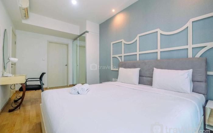Minimalist 1BR Apartment @ Casa Grande By Travelio