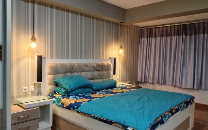 Apartemen Grand Kamala Lagoon by. Roomput