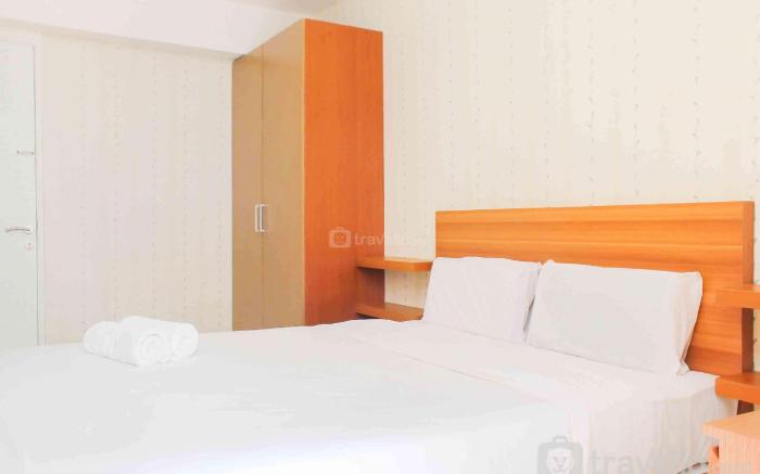 Cozy Studio at Bassura City Apartment By Travelio