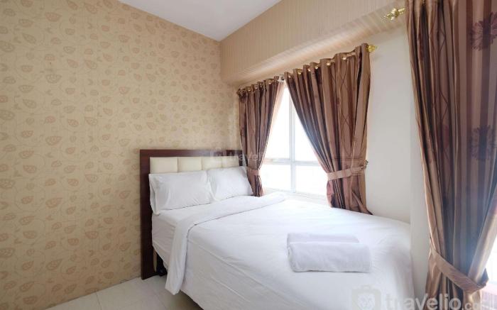 Warm Studio at Taman Melati Margonda By Travelio