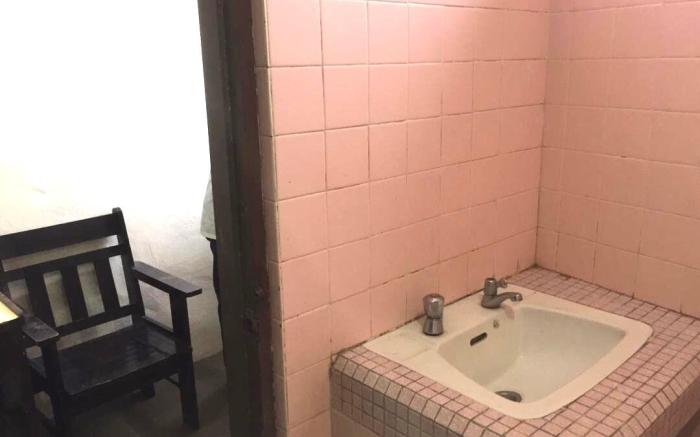 Simple, charming hotel room with private hot tub