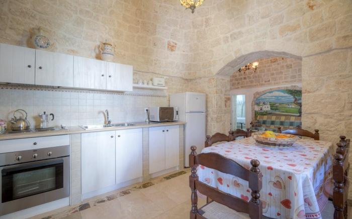 Trullo Corbezzolo by Typney