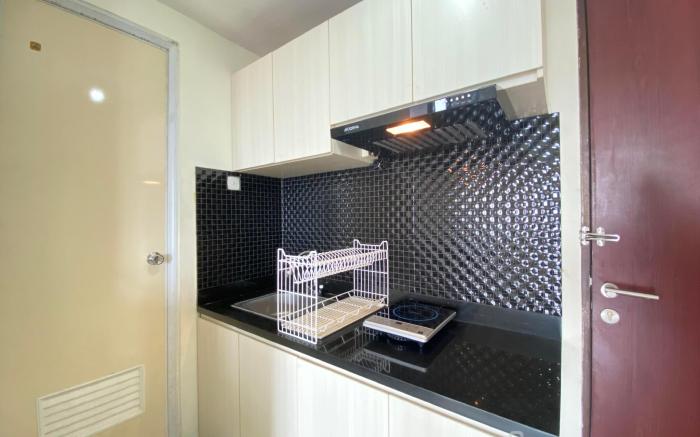 Bright 2BR at Tamansari Panoramic Apt By Travelio