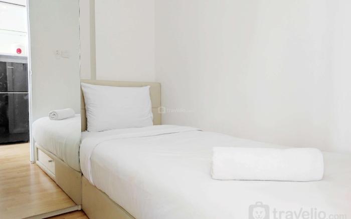 Cozy Stay and Homey 2BR Vida View Apt By Travelio