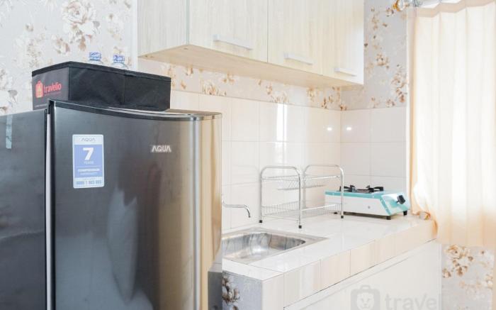 Homey Studio at Green Palm Residence By Travelio