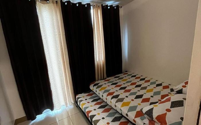Lovely 1BR Condo @SM Southmall 100mbps Netflix D+