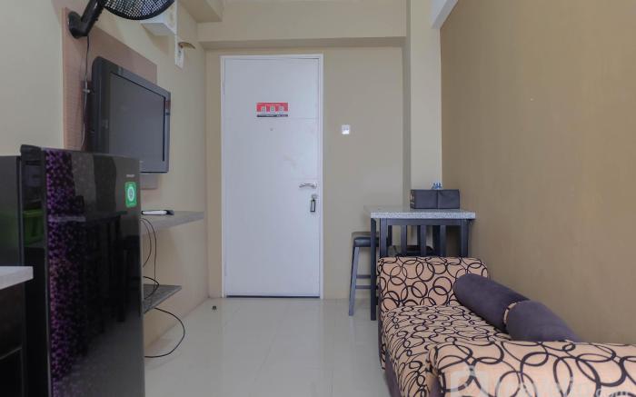 Strategic 1BR Bassura City Apartment By Travelio