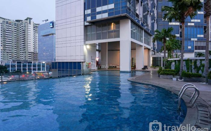 Fancy and Nice 2BR GP Plaza Apartment By Travelio
