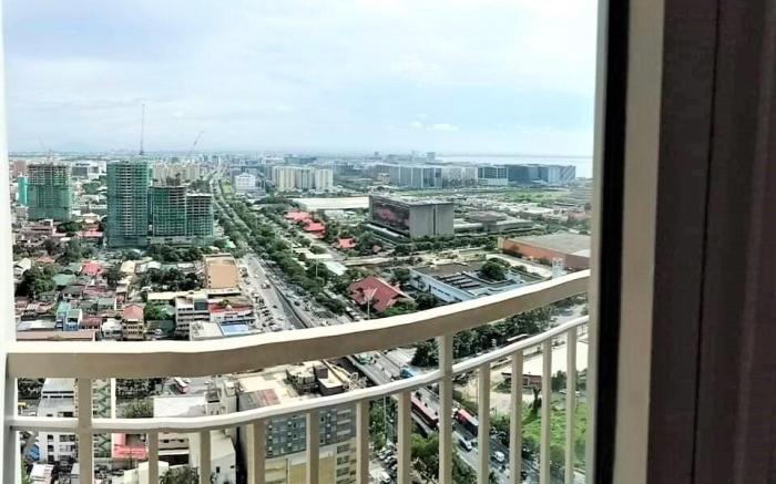 City and Sea View Staycation at Coast Residences