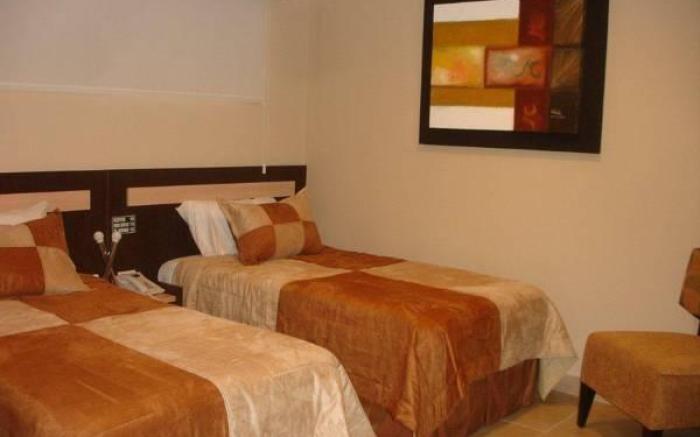 Hotel MC Suites - Confort cerca del Aeropuerto