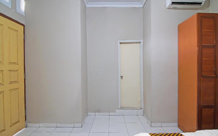 SPOT ON 91958 Flamboyan 25 Homestay Syariah