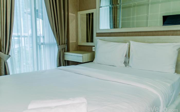 Homey and Warm Studio Room at Tifolia By Travelio