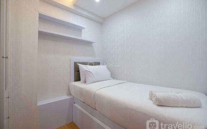 Fancy and Nice 2BR @Podomoro Golf View By Travelio