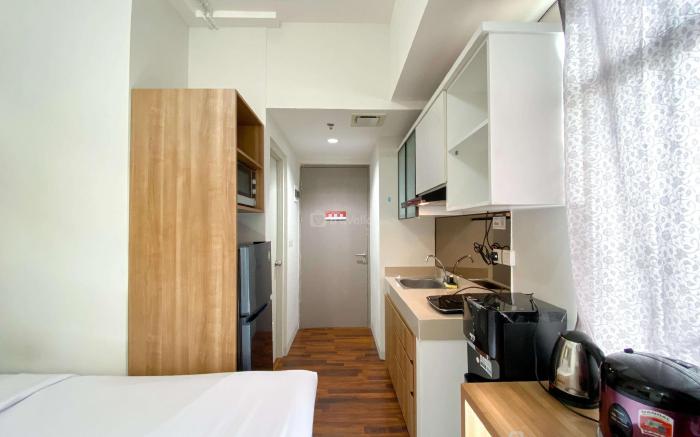 Modern Warm Studio at Vasanta Innopark By Travelio
