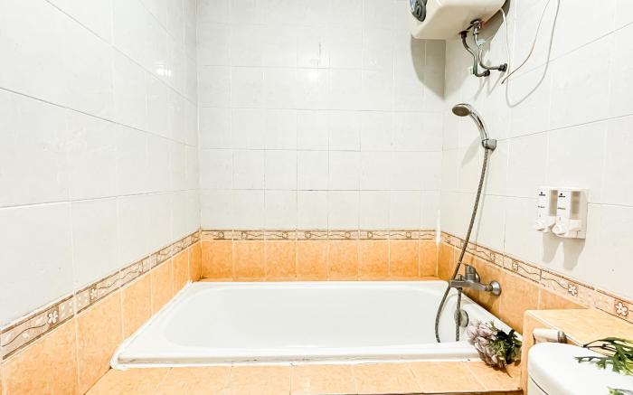 2BR with Working Room at Grand Palace By Travelio