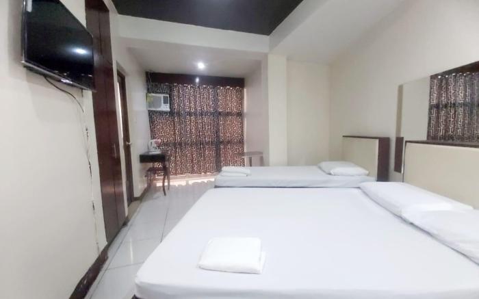 OYO 924 Cosmo Hotel Espana Near Ust