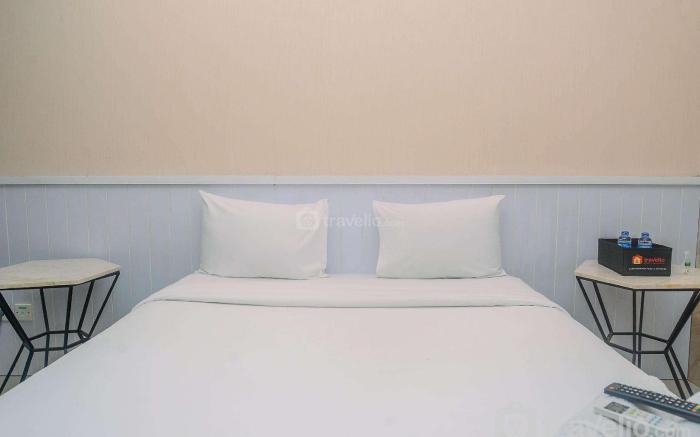 Minimalist Studio at Grand Dhika City By Travelio