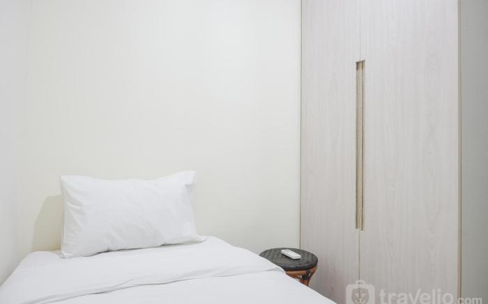 Elegant 2BR at 26th Floor Menteng Park By Travelio