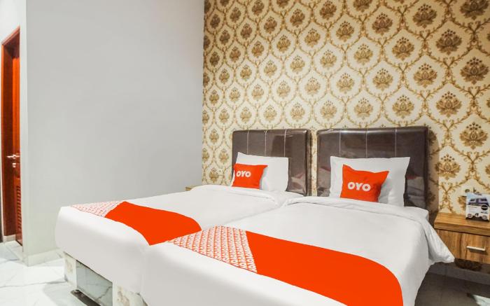 SUPER OYO Capital O 92066 Papakoel Hotel & Cafe