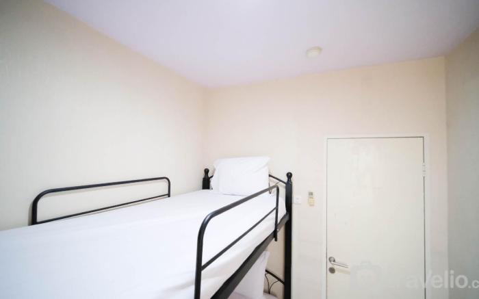 Best Location Homey 2BR at Twin Tower By Travelio